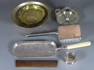 A silver plated chamber stick, a silver plated crumb scoop etc