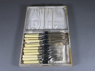 A set of 6 silver plated fish knives and forks, cased