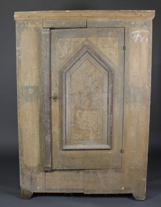 An 18th/19th Century Continental painted pine cupboard  enclosed by a panelled door 48"w x 69"h x 19"d