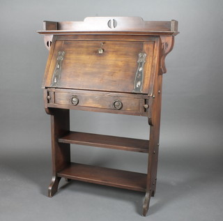 An Edwardian mahogany student's bureau with three-quarter  gallery and fall front above a drawer and bookcase beneath, 32"  x 45"