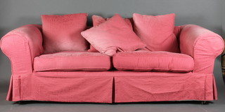 A 2 seat sofa upholstered in red material 89"