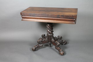 A William IV rosewood card table raised on a spiral turned  column and tripod base 36"w x 29"h x 18"d  ILLUSTRATED