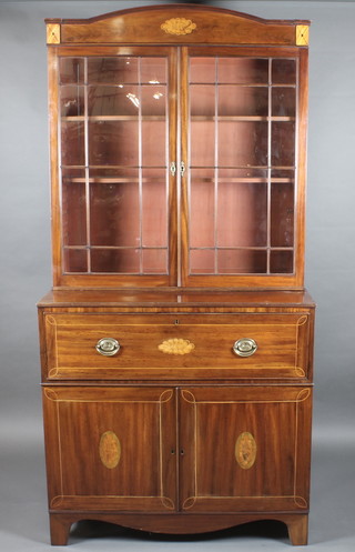 A handsome Georgian mahogany secretaire bookcase, the upper section fitted adjustable shelves enclosed by astragal glazed  panelled doors, the fall front revealing a well fitted interior above  a double cupboard 42"w x 87"h x 21"d   ILLUSTRATED FRONT COVER