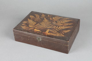 A Victorian wooden trinket box with hinged lid decorated ferns, the interior marked H Haberdashery Cabinet 9 1/2"
