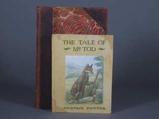 Charles Dickens, 1 volume "Pickwick Papers" with Brighton  Carlton Club library stamp together with a 1st edition Beatrix Potter "The  Tale of Mr Tod" published by Frederick Warne & Co London