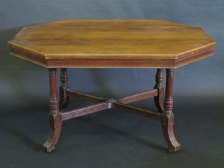 An Edwardian mahogany lozenge shaped aesthetic movement  centre table, raised on turned and reeded supports with X framed  stretcher, 50 1/2"w x 29"h x 38 1/2"d