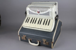 An Selmer Invicta accordion with 12 buttons, cased