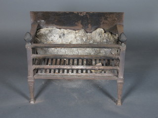 A 19th Century fire grate incorporating a fire back 20" x 11"