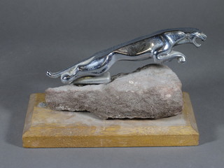 A Jaguar car mascot mounted on a section of stone 8"