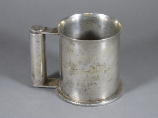A silver plated trench art mug formed from a 12lb shell case