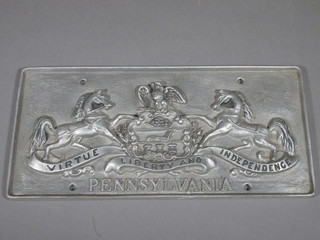 A rectangular cast aluminium sign marked Pennsylvania 12"