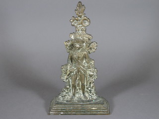 A 19th Century gilt metal door stop in the form of a standing soldier 12"