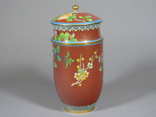 A cylindrical enamel cloisonne jar and cover 8"