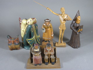 A carved wooden figure of a Don Quixote 10" and 5 various  carved wooden figures