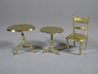 An oval miniature brass snap top tea table 3", a circular do. 2  1/2" and a ladderback chair 4"