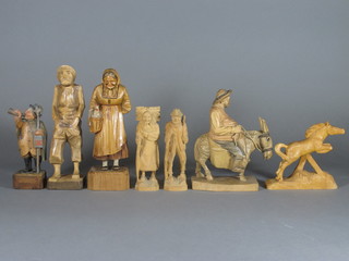 7 various carved wooden figures