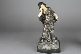 An Art Deco spelter and plastic figure of a seated lady 8"  ILLUSTRATED