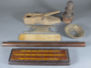 A turned wooden ruler, an inlaid mahogany cribbage board and a collection of treen