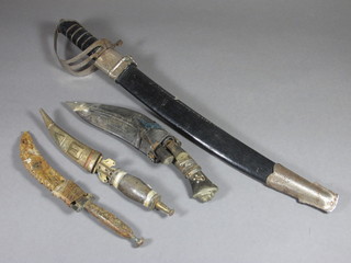 A reproduction Indian sabre with 15" blade, a miniature Kukri  with 6" blade, 2 skinning knives and leather scabbard, together  with 2 Eastern daggers