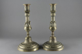 A pair of 19th Century gilt metal fluted candlesticks 10"  ILLUSTRATED