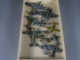A collection of various metal models of aircraft