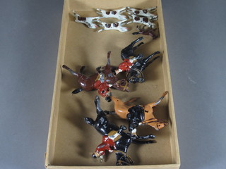 A metal hunt group comprising fox, hounds and 4 huntsmen