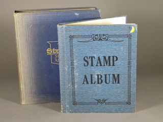 2 blue albums of various stamps