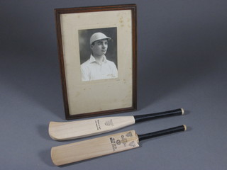A Nicholas model of a 1770 cricket bat 12" together with a Nicholas Extra Special cricket bat 12" and a black and white  photograph of a cricketer signed Nick 1934