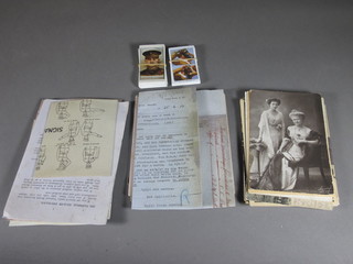 A small collection of postcards and other ephemera