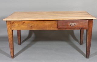 A 19th Century French cherry farm house table, fitted a frieze  drawer and pastry slide, raised on square tapering supports 59"w  x 29"h x 29"d