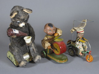 A Japanese Alps metal figure of a drinking bear and 2 clockwork pressed metal figures