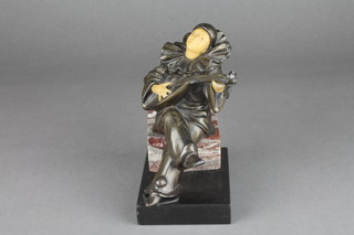 An Art Deco spelter and plastic figure of a seated Pierrot with mandolin 5"  ILLUSTRATED