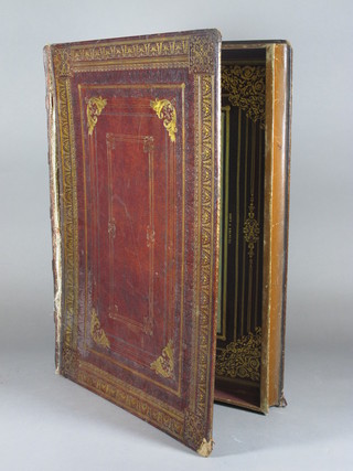 A leather trinket box in the form of a book, the interior marked  Town Emanuel, cover f, 15"