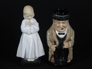 A Royal Doulton figure - Bed Time HN1978 RD842481 and a  Royal Doulton jug in the form of a seated Winston Churchill 5"