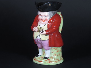 A Staffordshire Toby jug in the form of Toby Philpot 8"