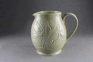 A Susie Cooper Celadon ground jug decorated tulips, the base incised Susie Cooper 6"  ILLUSTRATED