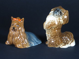 A Beswick figure of a seated Yorkshire Terrier the base marked  1944 4" and do. Pekinese base marked 1059 5"
