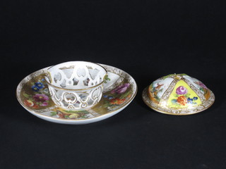 A circular Dresden pierced invalid saucer with panel decoration together with a porcelain lid