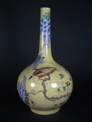 An Oriental yellow glazed and floral patterned club shaped vase,  the base with 6 character mark 17"