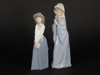 2 Nao figures of a Novice Nun 10" and standing girl 9"