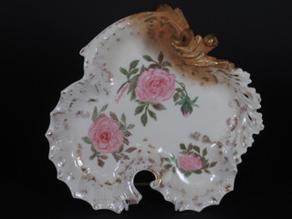 A French porcelain shaped hors d'eouvres dish the reverse  marked Siggy Nilson 1906 9"