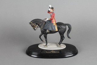 A Country Artists figure of HM The Queen in the uniform of a  Colonel of the Grenadier Guards riding Burmese 10"