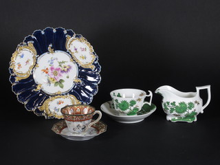 A "Meissen" blue glazed circular plate with floral decoration 9" together with a 19 piece 19th Century Spode tea service  comprising a pair of oval boat shaped dishes 10", a scallop  shaped dish 9 1/2", 4 side plates 8", cream jug, 6 saucers and 5  cups - 1 cracked and a 19 piece Oriental egg shell tea service