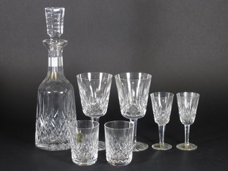 A Waterford cut glass decanter and stopper, 6 Waterford cut  glass wine glasses, 6 Waterford cut glass liqueur glasses and 6  ditto tumblers