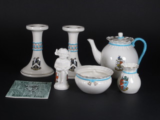 A Goss teapot decorated The Arms of Hove, do. bowl - Arms of  Margate 4", do. jug and bowl - Ramsgate and a pair of candlesticks - Arms of Kingston 6" and a figure of The Lincoln  Imp