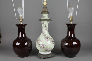 A porcelain table lamp with gilt metal mounts 16" and 2 Ox  blood style table lamps