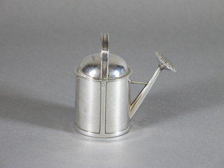 A Victorian silver perfume bottle in the form of a watering can, London 1884
