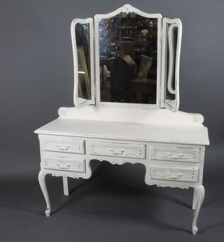 A Continental white painted dressing table with bevelled plate mirror, the base fitted 1 long and 4 short drawers, raised on  cabriole supports 51"w x 67"h x 17"d