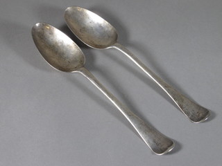 A pair of 18th Century silver table spoons, Exeter 1746, 4 ozs