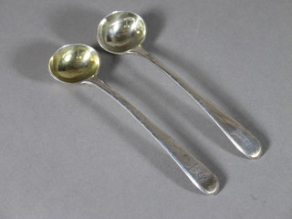A pair of Georgian silver Old English pattern mustard spoons London 1804